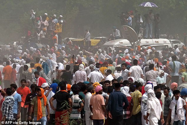 Thousands of people descended on the village of Jawaharke to pay their respects as Moose Wala's body was cremated (pictured)