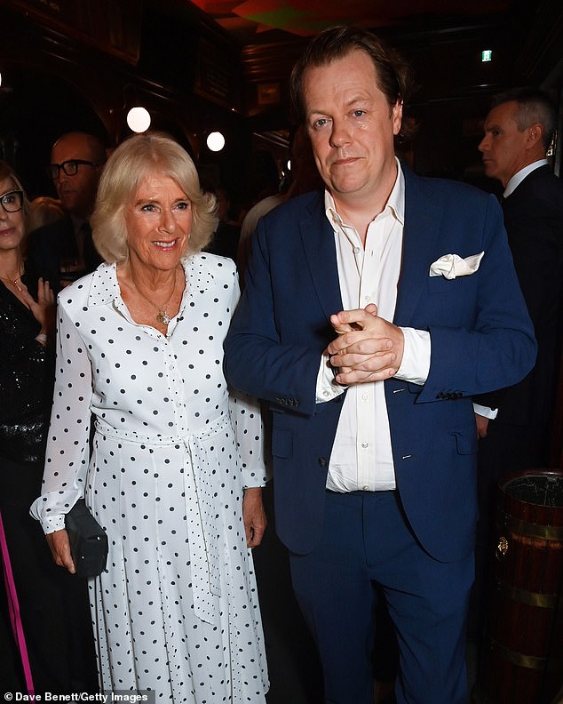 The son of Queen Camila said he enjoys chowing down on 'cheap American-style cheese slices', insisting on corner shop versions only, and then topping it with cracked black pepper and Tabasco. Pictured, right, with his mother Queen Camilla