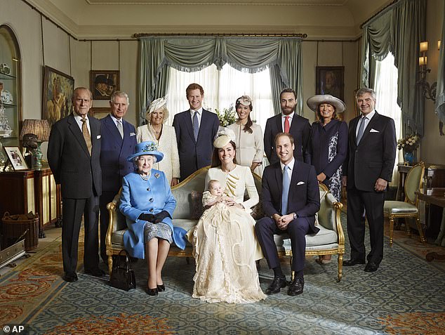 The official christening photo of Prince George photographed in the Morning Room at Clarence House in London on October 23, 2013