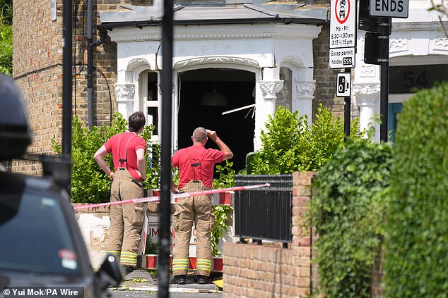 Fire officers on the scene on Dumont Road in Stoke Newington, North East London, on June 17
