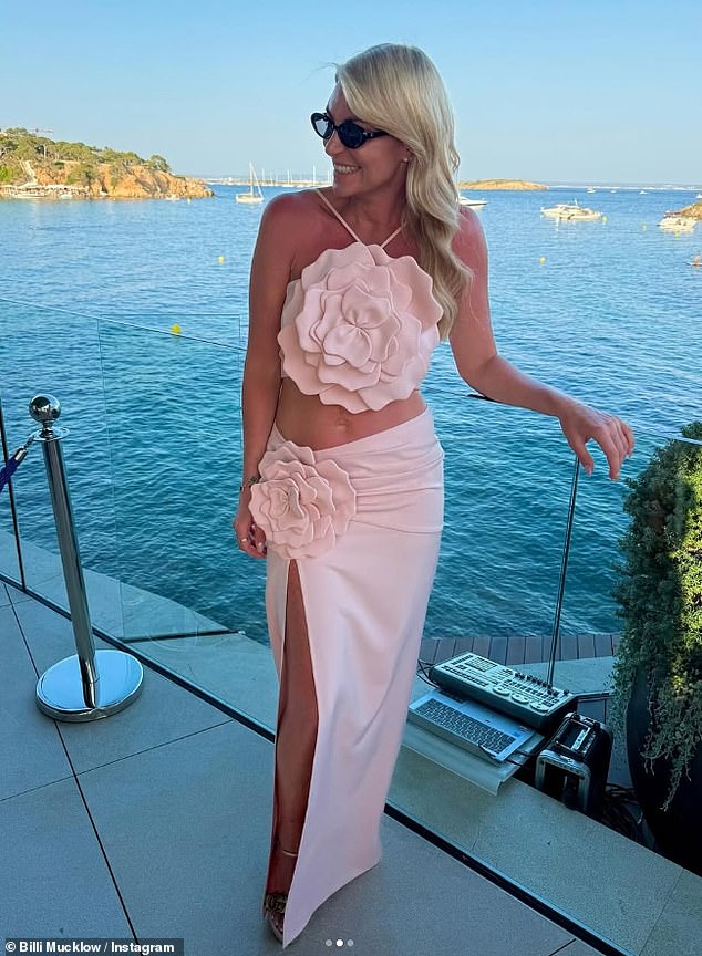 The TOWIE star, 37, who officially split from Premier League player Andy Carroll last September, was soaking up the sun in Mallorca for Georgia Kousoulou's lavish wedding