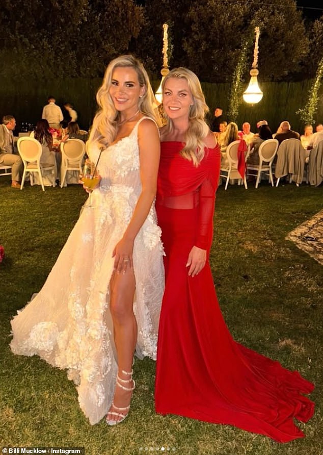 For Georgia's wedding day Billi looked gorgeous in an off the shoulder red dress while posing with the bride