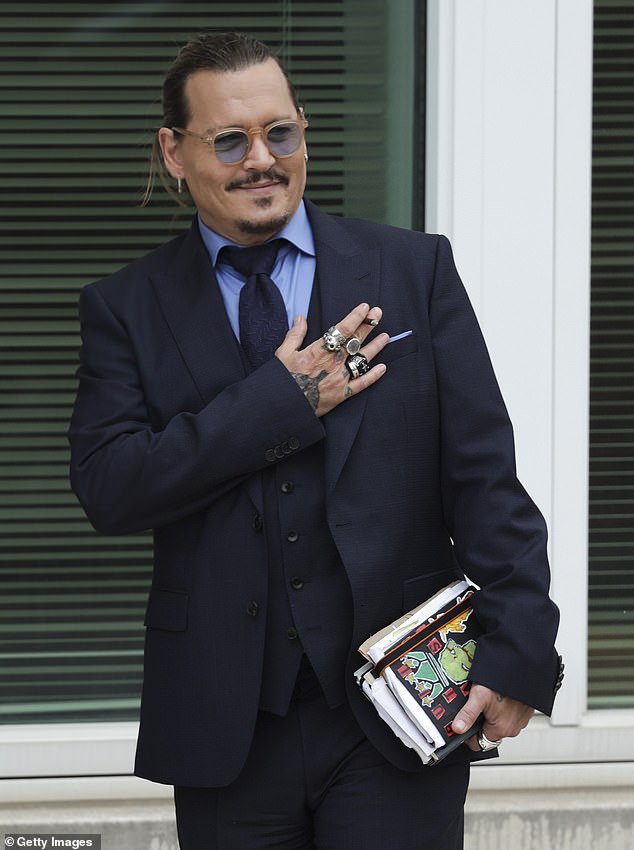 Johnny pictured during the trial at Fairfax County Courthouse