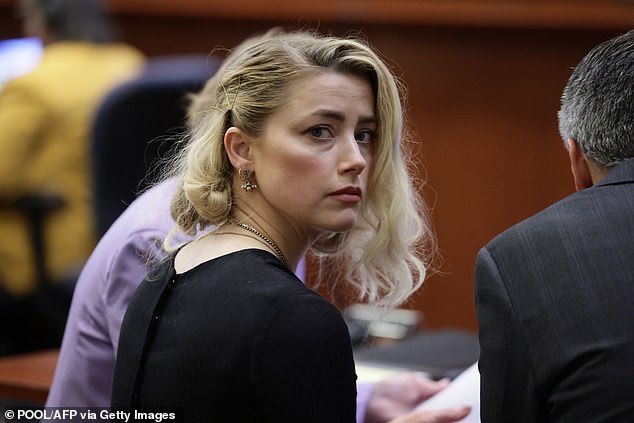 During the Depp v. Heard trial that came to an end in June 2022, Johnny received a rally of support from fans at the Fairfax County courtroom in Virginia (Amber pictured during the trial)