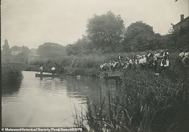 Locals seen during the search for the killer shark back in 1916