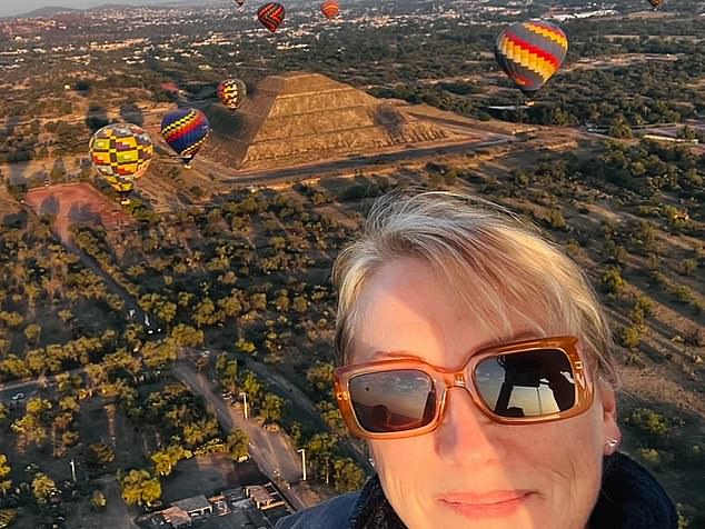 During her year out from the BBC, Martine Croxall spent time travelling around the world. Pictured: On a hot air balloon in Mexico