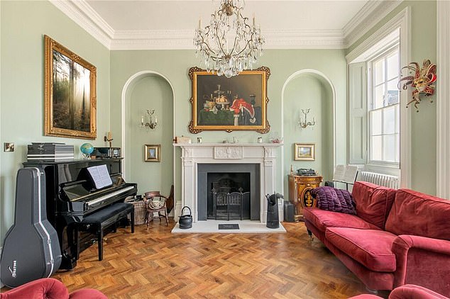 The 4,720 sq ft property also includes period features typical of houses of its era including fireplaces in eight of the rooms, tall ceilings with roses, original ornate cornices and large shuttered windows which flood the rooms with natural light