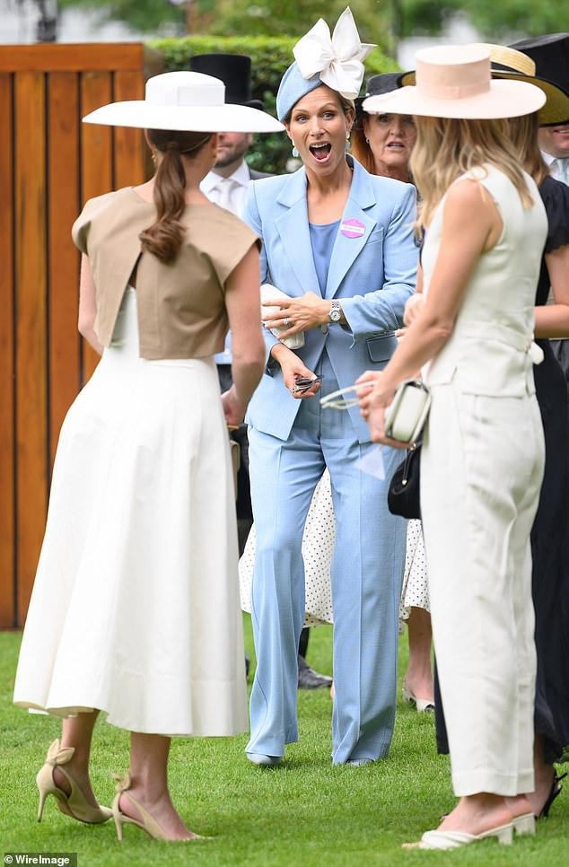 The mother-of-two looked elegant in a flowing, cream skirt as she chatted with Zara Tindall at the event