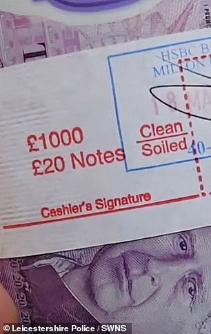 The video showed the 28-year-old crook packaging his ill-gotten gains into an envelope