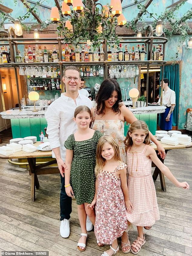 The family are pictured in a Parisian restaurant