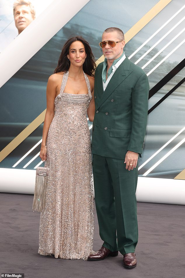 Ines stunned in a gorgeous floor-length, halter-neck dress that featured silver sequins and sparkling details throughout, creating a shimmering effect