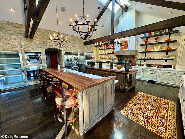 The kitchen of Perry's Montecito mansion. She had been dead set on making Wesctott's former eight-bed, Mediterranean-style compound her family home