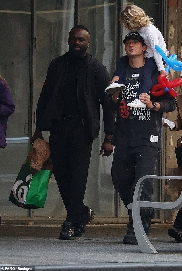 Orlando Bloom joined Katy Perry and their daughter Daisy Dove, five, in Australia on Sunday amid rumors of trouble in their relationship