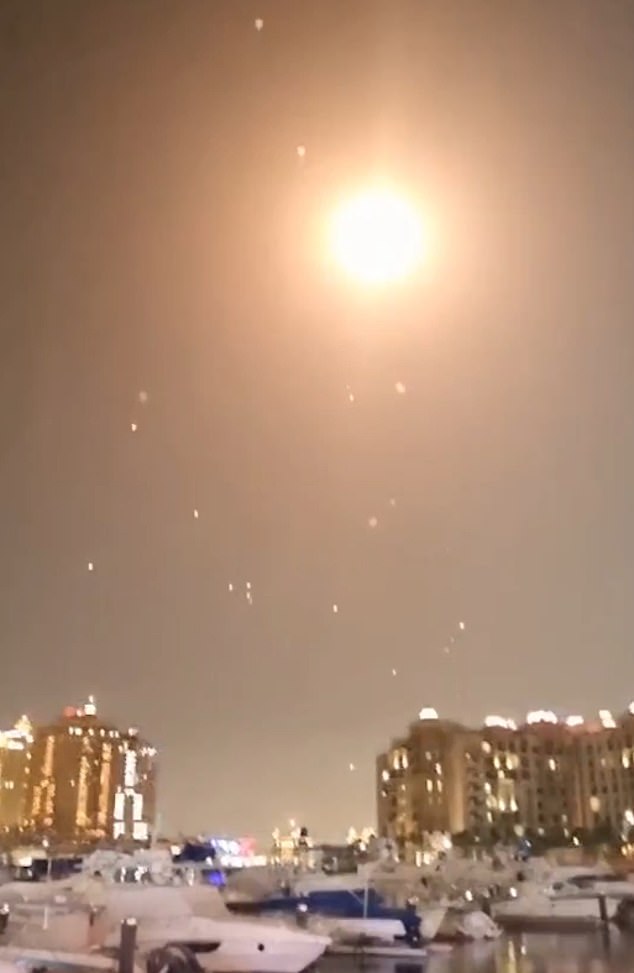 An explosion seen above DohaIran launched missiles at Al-Udeid base near Doha, Qatar
