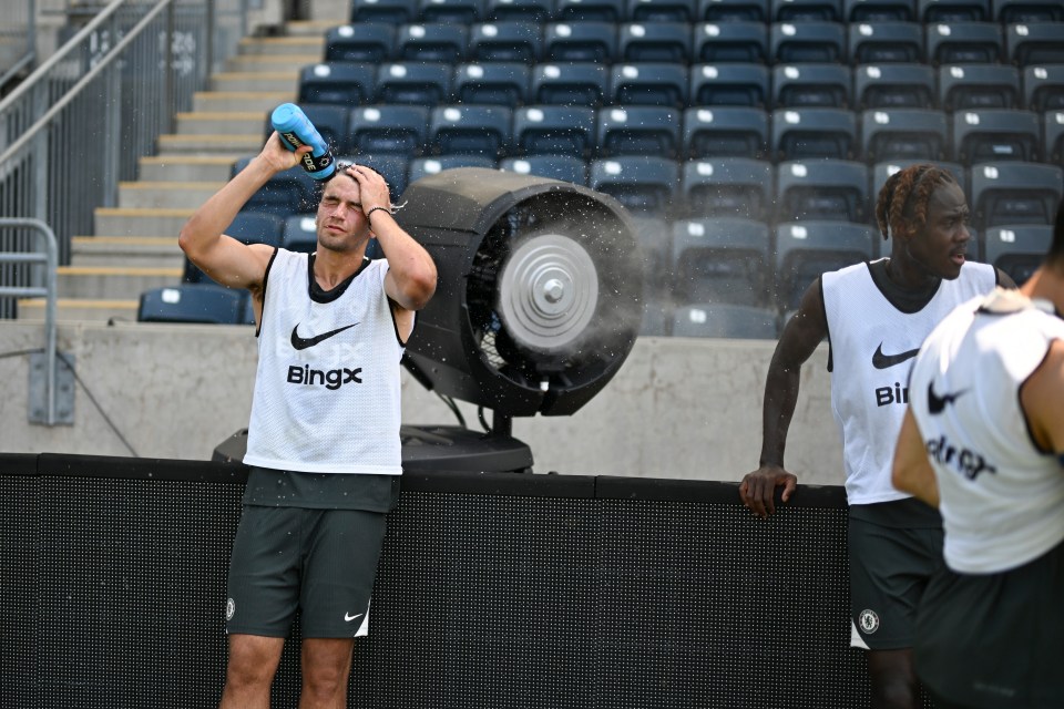 Chelsea F.C. players cooling down after training.