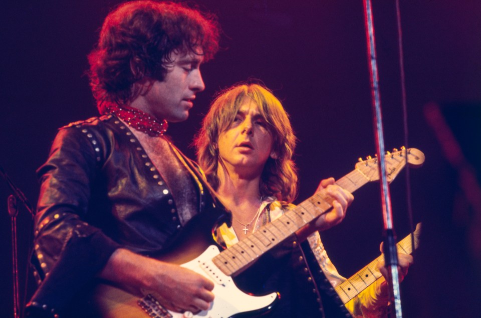 Paul Rodgers and Mick Ralphs of Bad Company performing on stage.