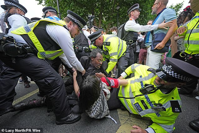 Ugly scenes broke out on Monday afternoon as protesters and police clashed on the floor