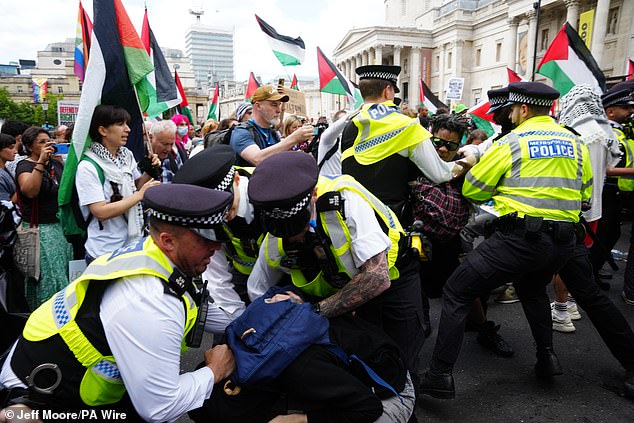 Ugly scenes break out as protesters and police clash in Trafalgar Square on Monday afternoon