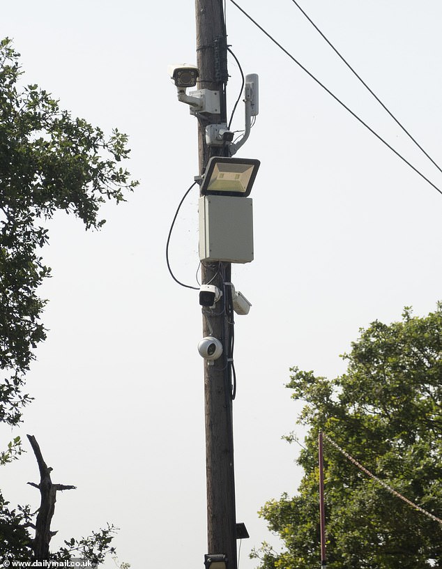 The site is bristling with CCTV cameras and other visible security