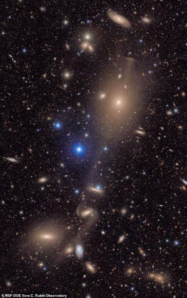Another small section of the same image shows spiral galaxies interacting in the heart of a dense galaxy cluster
