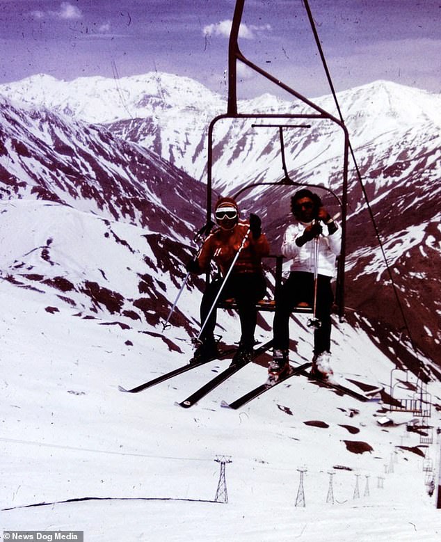 Skiers pictured on a chair lift at a resort in Iran in the 1970s