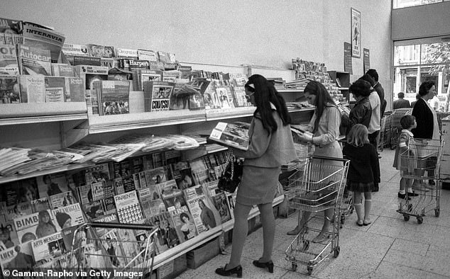 Iranian women reading magazines in a supermarket in Tehran, 1968