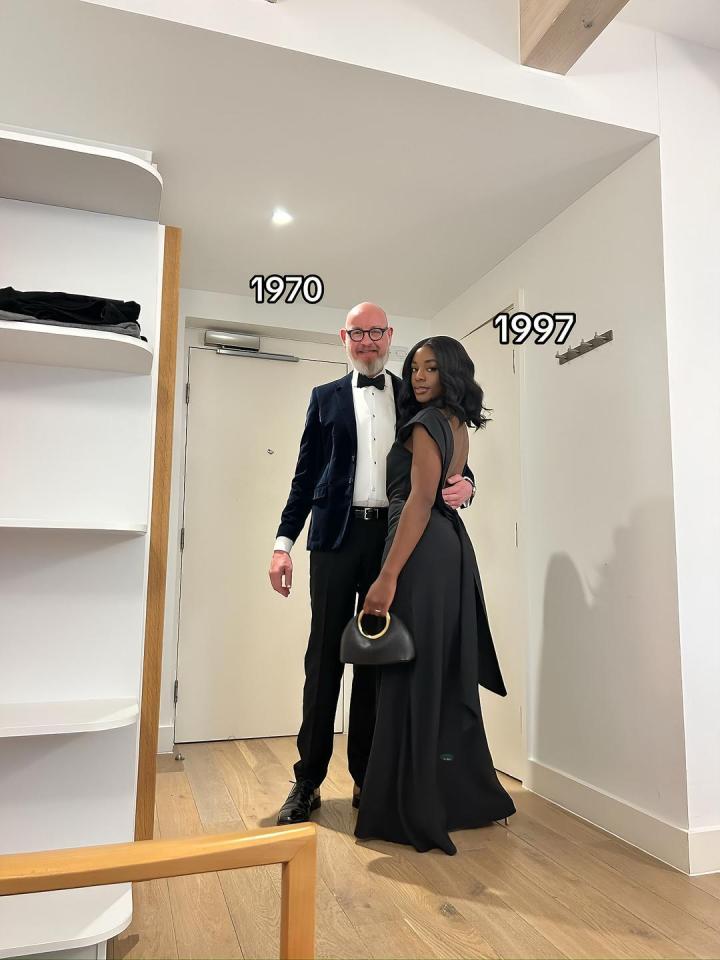 Couple in formal wear, woman in black dress and man in tuxedo.
