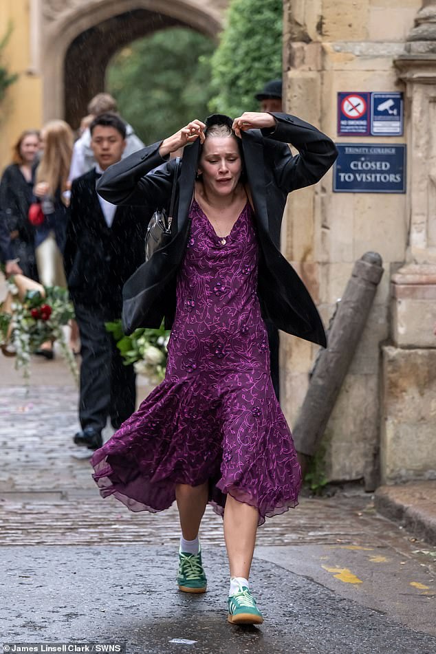 Those leaving the morning after still in their best attire were caught unprepared for the rain, with some using their jackets, towels and even a cardboard box to keep them dry from the drizzle