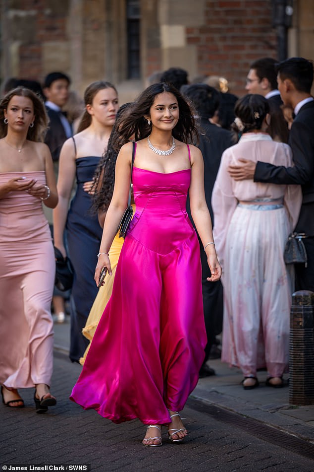 The dress code states that dresses must be 'appropriate formal evening wear and below the knee,' adding that floor-length ballgowns are usually the standard