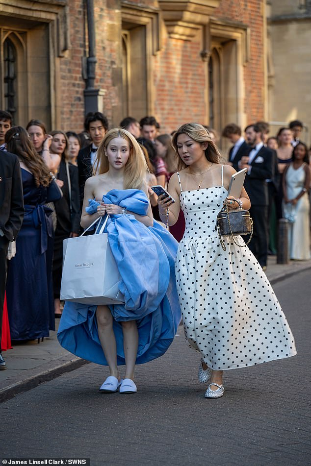 One woman opted for a white polka-dot dress whereas another went for a puffy blue ballgown