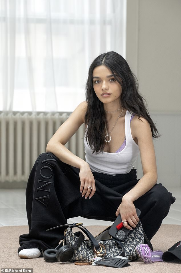 In another look, Rachel wore a simple white vest top with black tracksuit bottoms