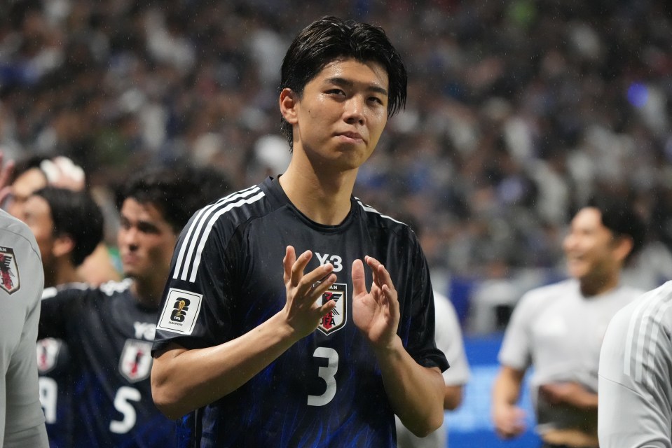 Kota Takai of Japan applauds supporters.