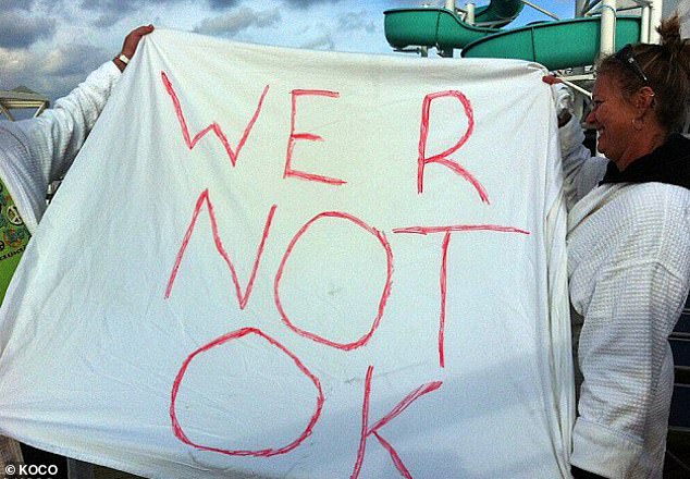 Passengers wrote on bedsheets to express their horror while trapped aboard the Triumph