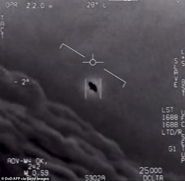 This file video grab image obtained April 28, 2020, courtesy of the US Department of Defense shows part of an unclassified video taken by Navy pilots that have circulated for years showing interactions with 'unidentified aerial phenomena'