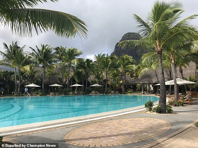 Miss Hewitt was sent to Mauritius' five-star Paradis Hotel for a training and team-building event, to which Herbalife distributors who had achieved qualifying high sales were invited (Pictured: the pool where Miss Hewitt cut her foot)