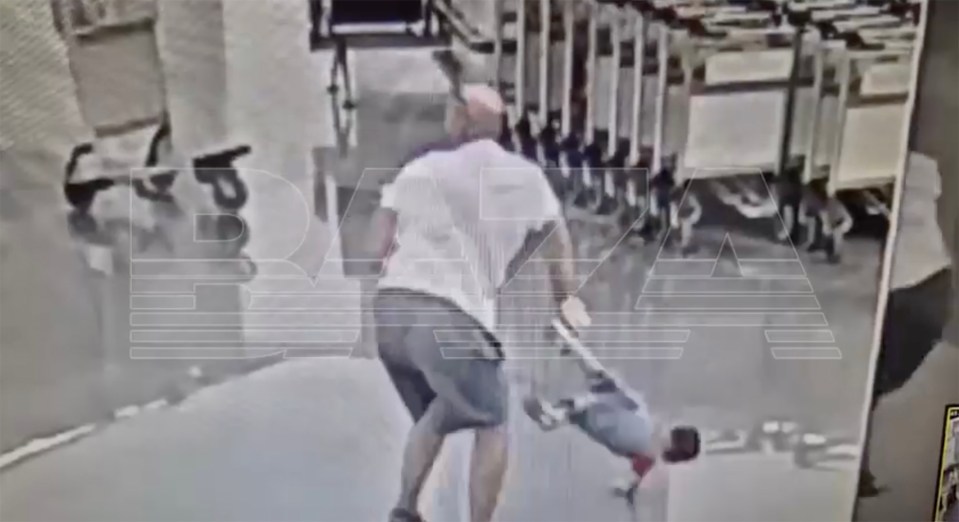 CCTV footage of a man throwing a toddler to the ground.