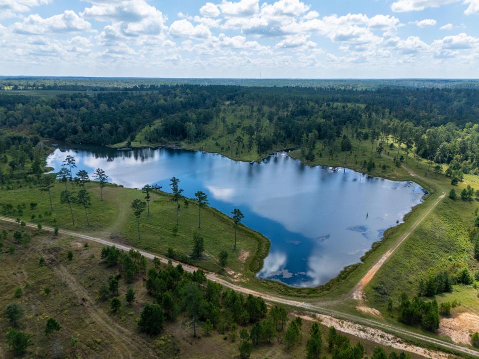 Aerial view of a lake on a ranch.