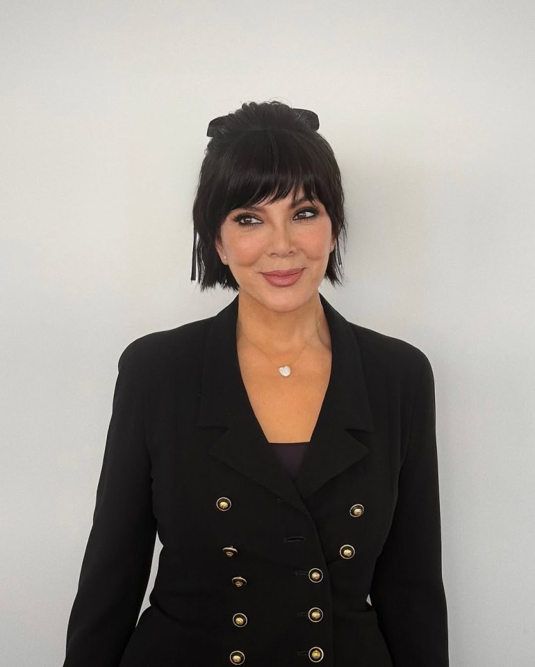 Kris Jenner in a black blazer.