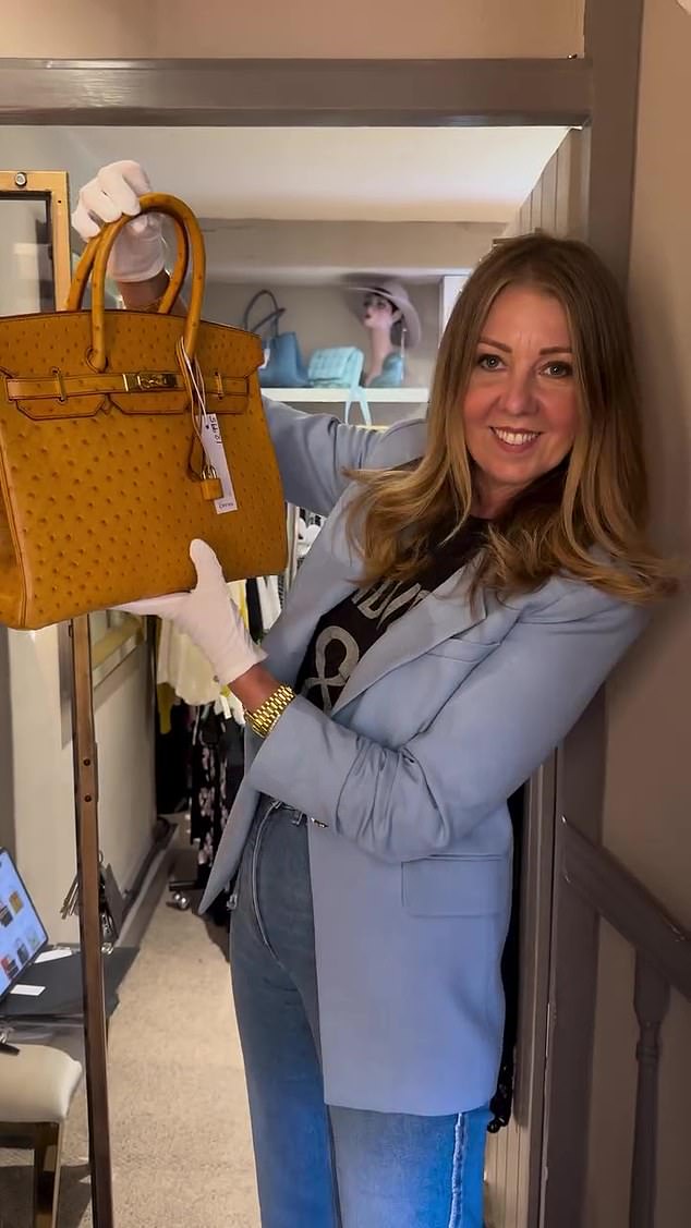 Christine Colbert with one of the Hermes handbags she sells from her designer boutique