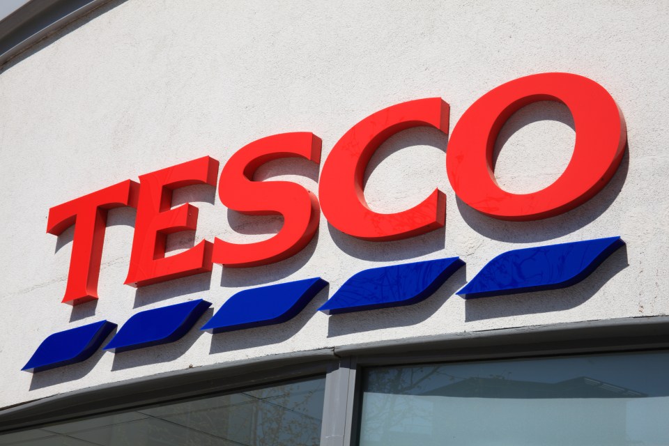 Tesco logo on a store building.
