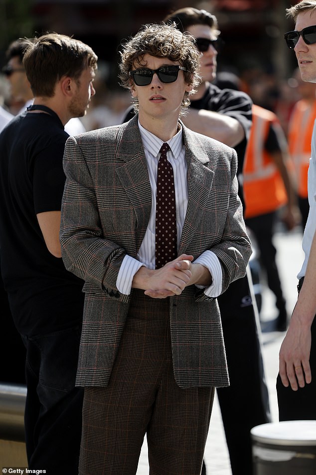 He completed the look with a pair of shades