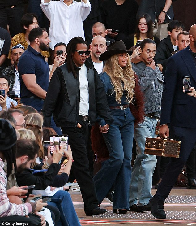 Beyoncé and Jay-Z turned heads as they arrived hand-in-hand at the runway show, looking as effortlessly stylish as ever