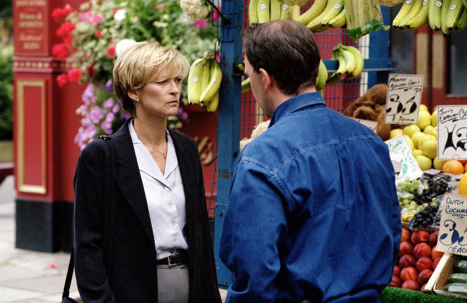 Gillian Taylforth and Todd Carty in a scene from a BBC television program.