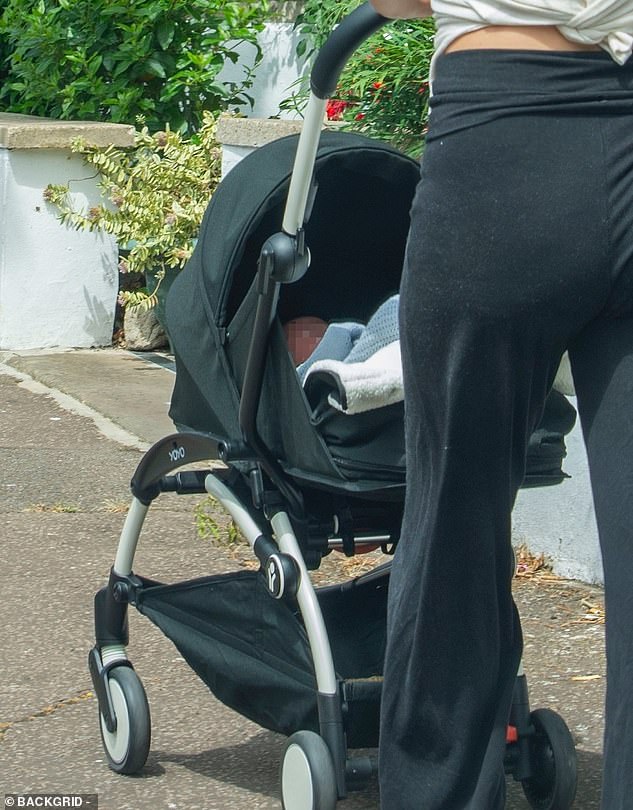 The singer, 28, embraced life as a new mother on Tuesday as she enjoyed a relaxing stroll with her newborn baby in London