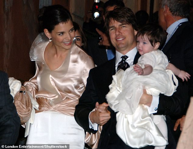 Tom Cruise and wife Katie Holmes with their then-seven-month-old daughter Suri as they headed to their wedding rehearsal dinner at Nino's Restaurant at the bottom of the Piazza De Spagne (Spanish Steps) in Rome, Italy two days before their fairytale wedding