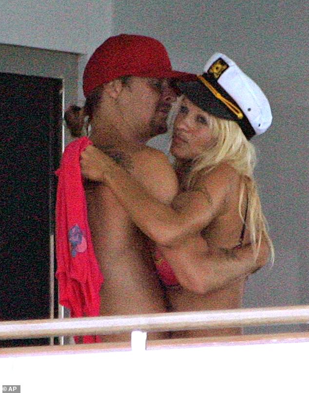 Instead of donning a white gown, the former Baywatch star put her on spin on the bridal dress code by wearing a white string bikini and captain's hat
