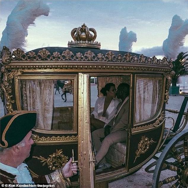 Kim and Kanye as they arrived at the palace in a carriage that once belonged to the French monarchy