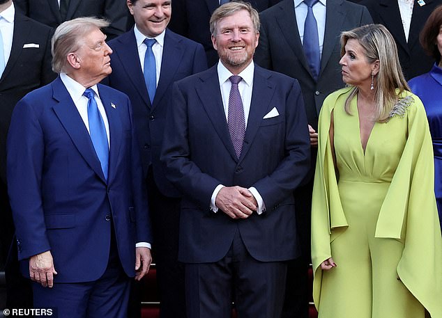 Trump and Dutch Queen Maxima look at each other while King Willem-Alexander smiles for a photo