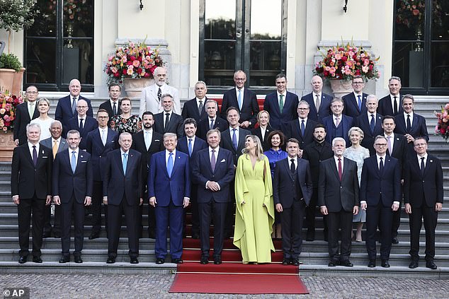 Dutch Queen Maxima appeared to laugh and look over at her husband and Trump while posing for a group photo