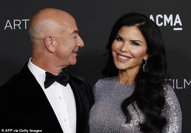 Amazon founder Jeff looks lovingly at his now-fiancee during an event in Los Angeles in 2021